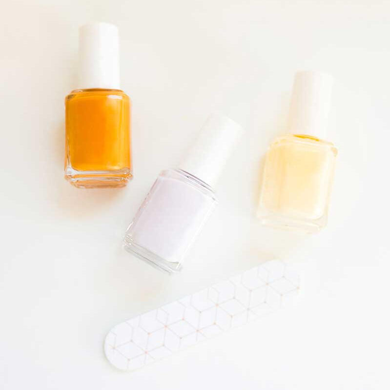 nail polish bottles and nail file